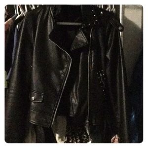 Faux leather jacket with studs and belt